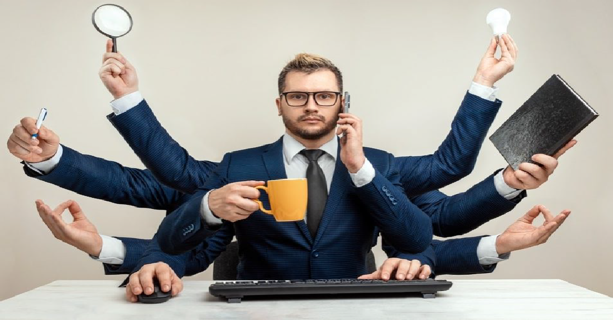 Illustration of a business professional with eight arms holding tools like a notebook, smartphone, coffee mug, and light bulb — symbolizing the multitasking demands that Virtual Assistant Help can relieve.